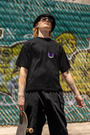 Urbaxo's oversized T-shirt with a striking monster illustration on both the front and back, designed for ultimate comfort and bold street fashion