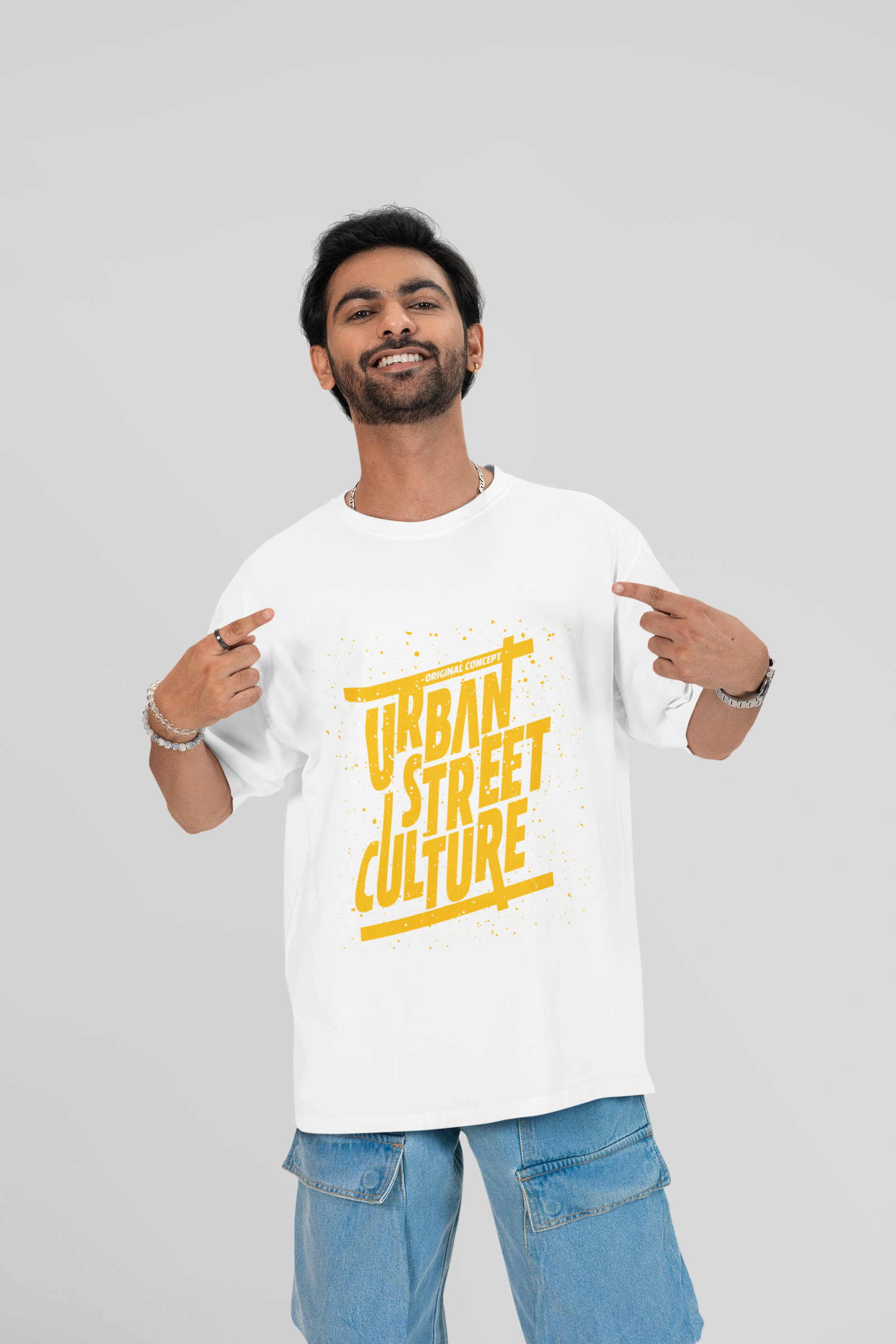 Trendy oversized white t-shirt with Urban Street Culture graphic by Urbaxo