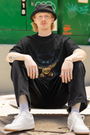  A striking fire design printed on an oversized T-shirt from Urbaxo, offering a modern, relaxed look for urban fashion lovers