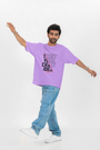 Lavender oversized T-shirt with front "Crazy Idea" text, combining soft tones with a confident message.

