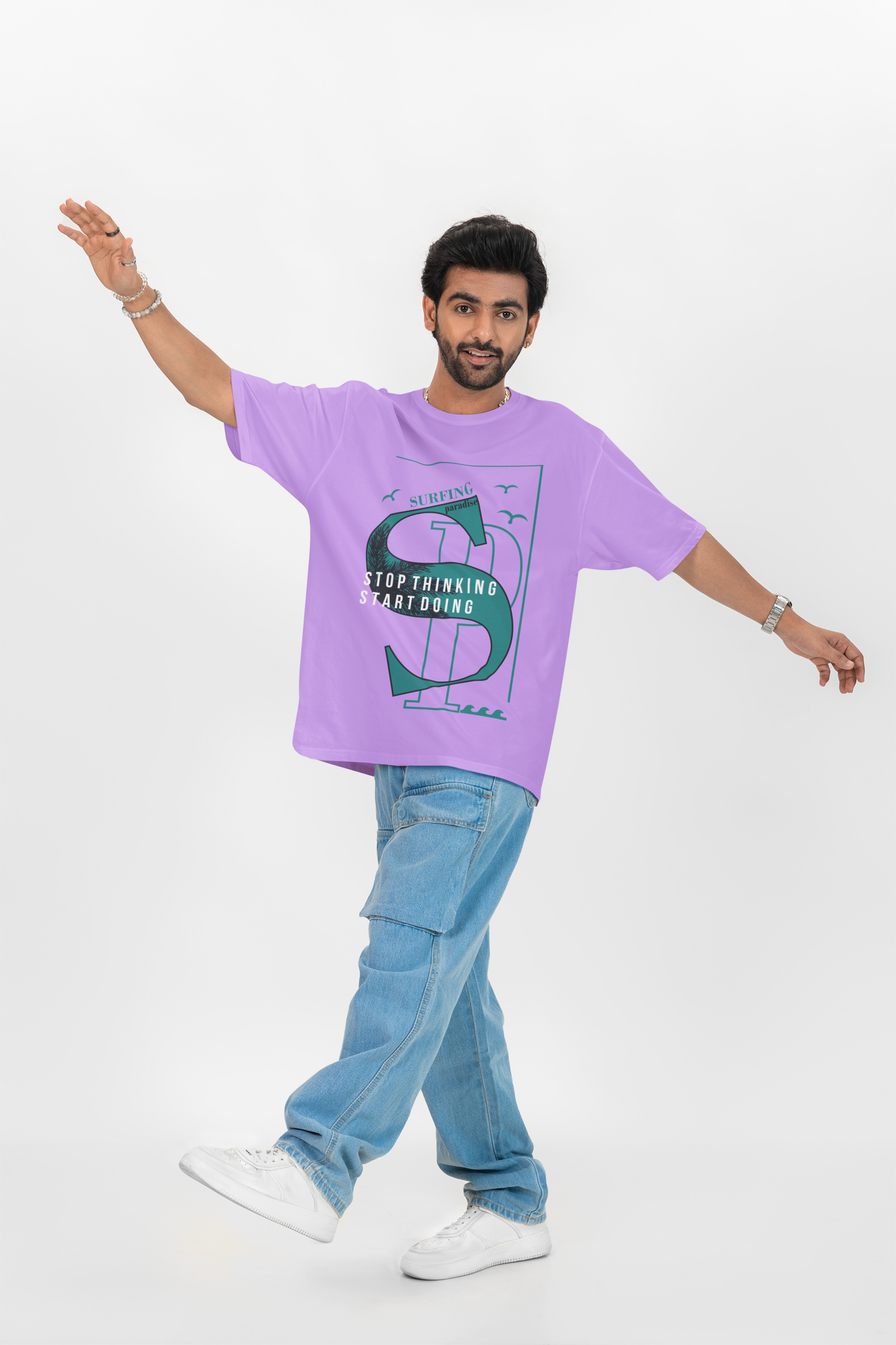 Pastel lavender oversized T-shirt with "California" lettering on the front, crafted for a soft and breezy streetwear look.